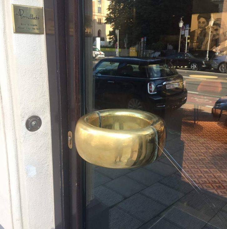 “The door handle for this jewelry store looks like a gold ring.”
