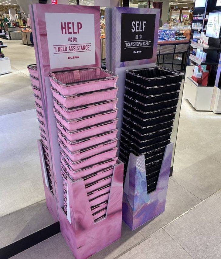 “These 2 different sets of shopping baskets at a department store in Bangkok — for those that need help or want to be left alone.”