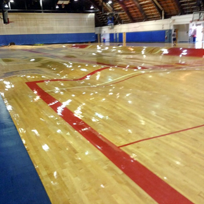 interesting pics - pipes burst under basketball court
