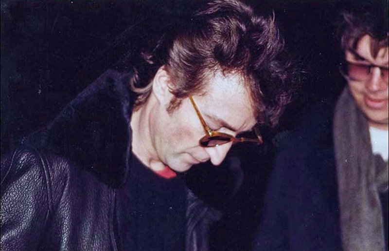 John Lennon signs an autograph for Mark Chapman – his murderer, 1980