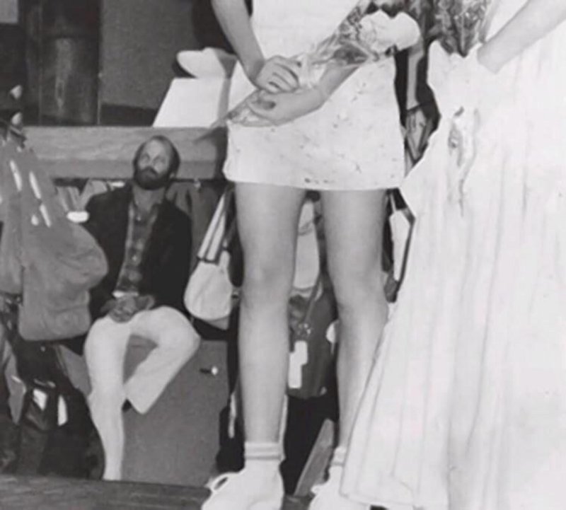 Serial killer Christopher Wilder watches Seventeen magazine pageant winner Michelle Korfman (seen in the foreground holding flowers) shortly before he abducted, raped, and murdered her