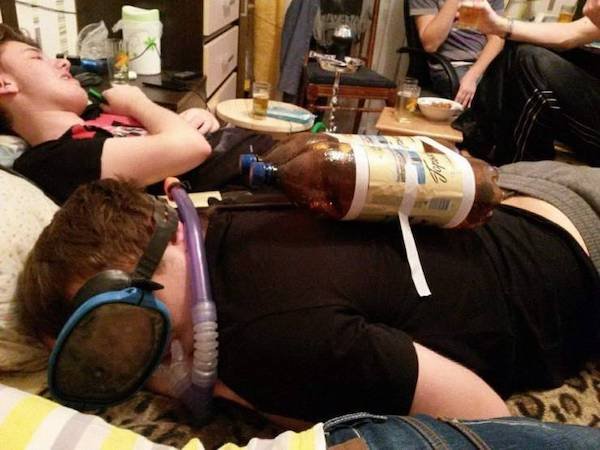 funny memes - guy with beer bottles taped to his back passed out drunk