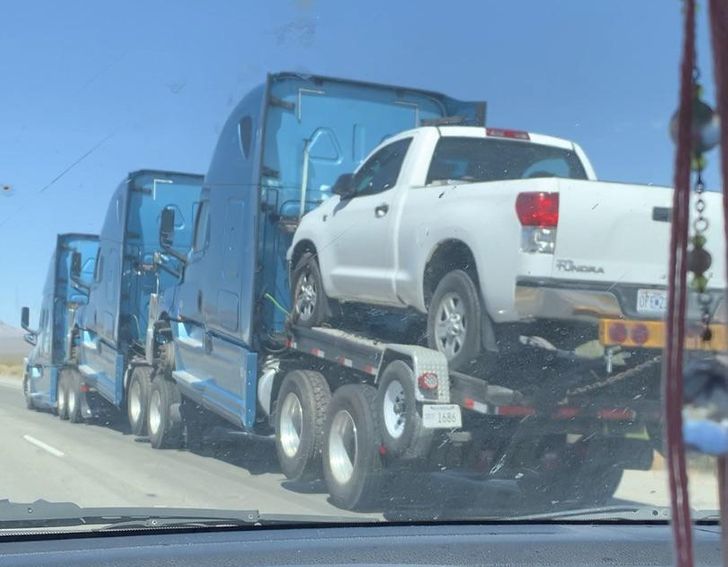 “A truck hauling a truck hauling a truck hauling a truck”