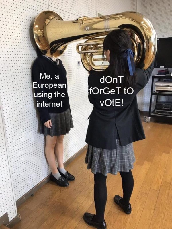 girl putting tuba on girls head - Me, a European using the internet dOnT fOrGeT to Vote!