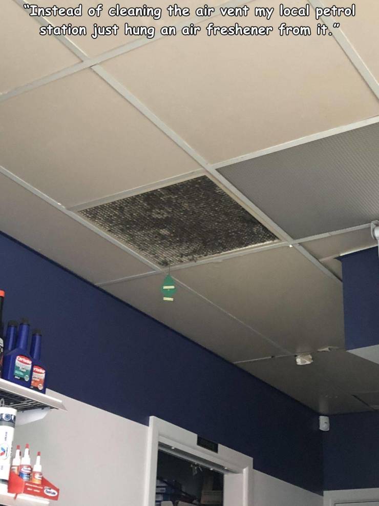 ceiling - "Instead of cleaning the air vent my local petrol station just hung an air freshener from it.