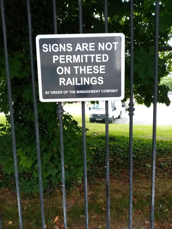 sign - Signs Are Not Permitted On These Railings By Order Of The Management Company