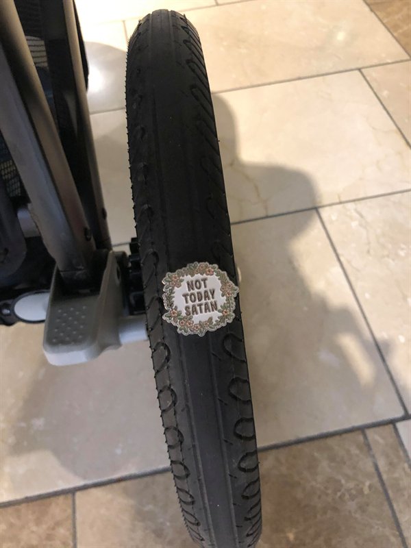 “Noticed our stroller felt a little weird, found out there’s a pin stuck in the tire. The pin is very ironic.”