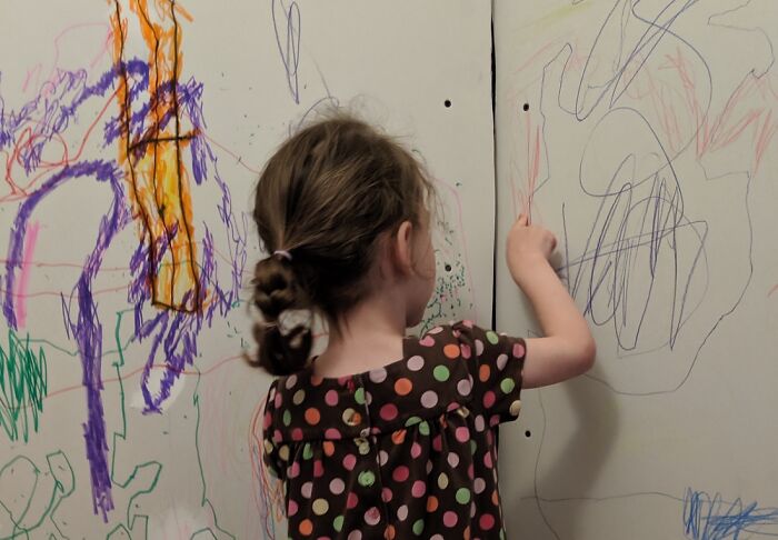Not a parent, but when I was little I noticed my sister was writing her name on the walls with crayon. Taking on the role of Helpful Big Sister, I informed her that if she was going to graffiti things she shouldn't write her name and give herself away. A few weeks later she carved patterns — and MY name — into the desk in the study.
