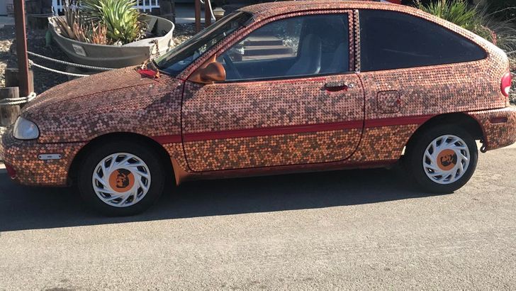 “Found a car decorated with pennies.”