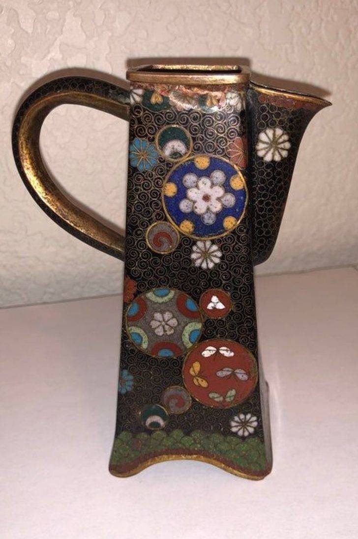 “Found this at Goodwill for $2. Only 5×2 inches and very ornate.”

A: “It’s just a small cloisonné (or pitcher) chocolate pot for serving hot chocolate.”