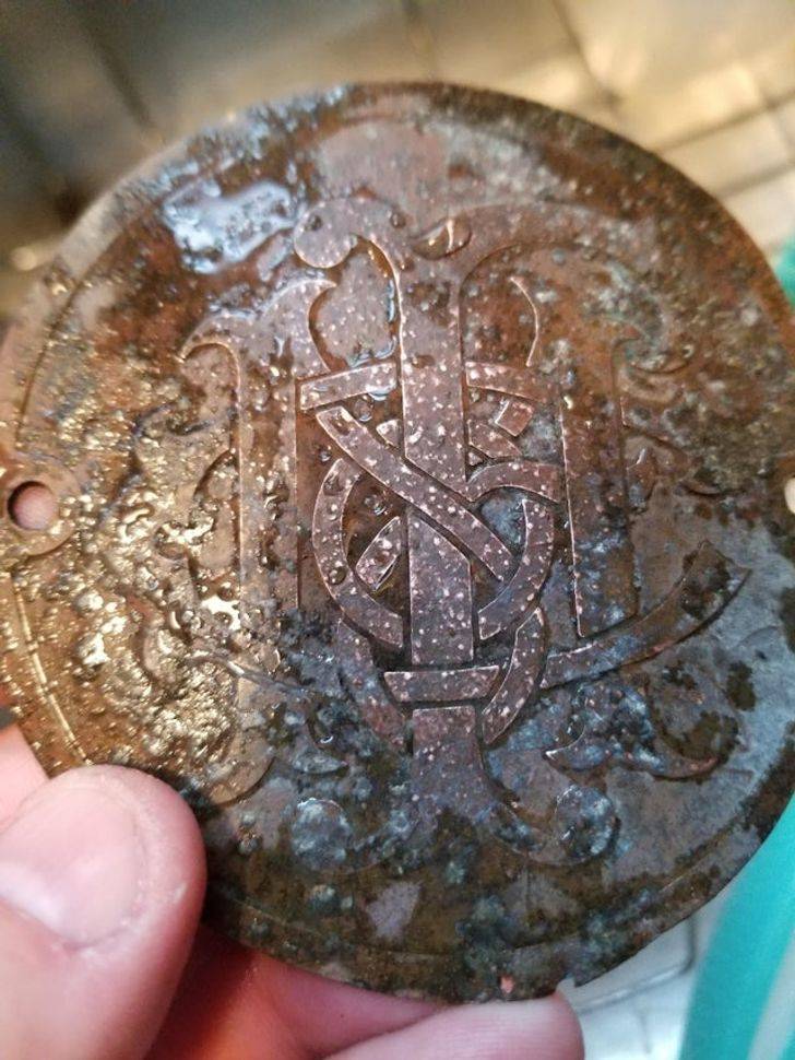 “Found this in my yard buried a foot deep.”

A: “It looks like a fire mark. They were attached to homes near the front door to show that you paid for your fire insurance. This way, the original fire insurance companies (think fire department) would actually work to put out a fire that started in your home.”