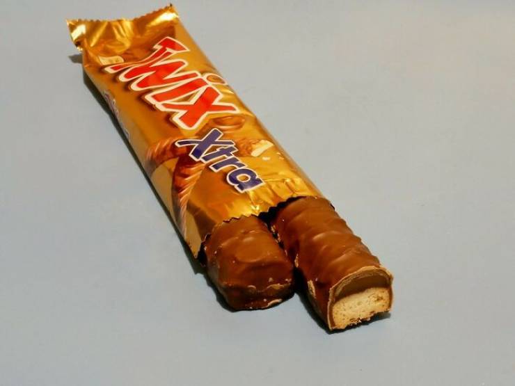 "Many well-known chocolate bars have been shrunken down over time, but their prices haven't changed. For instance, a Twix bar is now about 14% smaller than it was back in the day. Apparently, in 2012 Mars, Inc. (who make Twix) announced a 250 calorie cap on all single-serve chocolate bars, and because of that, many of their products have been downsized."