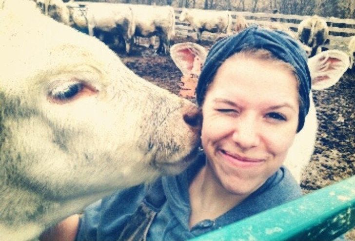 “Took a picture of my wife and her cow, we didn’t notice the awesome coincidence until later..”