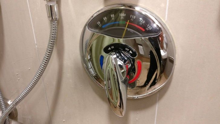 shower knob tells temperature - 100F 90 32 110 80 720 130 27 54