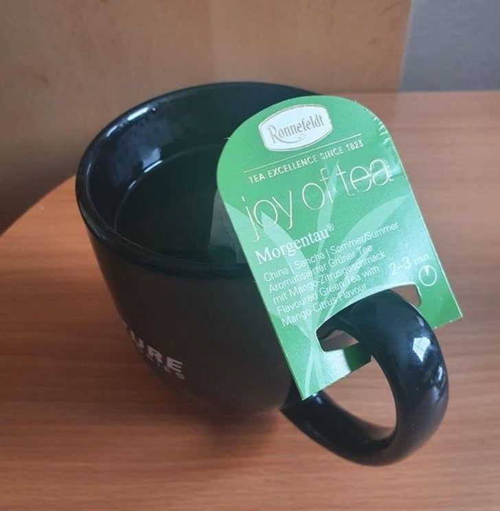cup - | Ronnefeldt Tea Excellence Since 1823 ipy oftea Morgentau Chinal Sencha SommerSummer Aromatisierter Grner Tee mit MangoZitrusgesemack Flavoured Green Tea with MangoCitrus Flavour