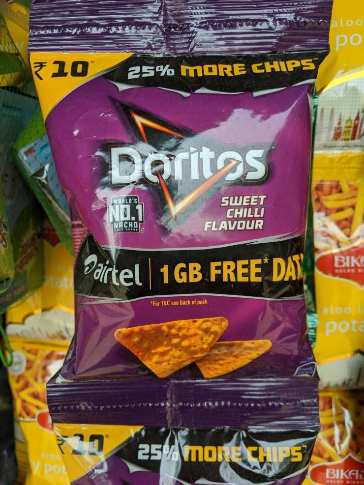 cool stuff people saw - doritos - Saloo po 25% More Chips 10 Doritas Sworld'S No.1 Sweet Chilli Flavour Nacho Her Bik Pactel 1GB Free Dat For T&C see back of pack pote 21 25% More Chips Biker