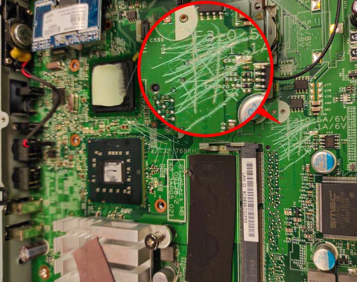 “Someone played Tic-Tac-Toe on the motherboard (?!)”