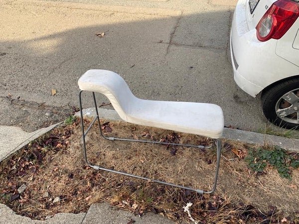 It is a chair looking thing. The white is cushion. It was on the curb and I thing it is to do the sex.

A: It is an Ikea Jesper bench. For playing video games.