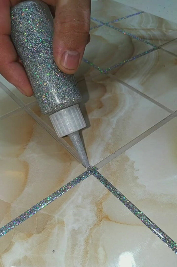 Feeling Insecure About How Unoriginal And Boring Your Bathroom Tile Grout Is? Want To Make A Statement? Simply Just Cover It Up With Some Glitter Glue!