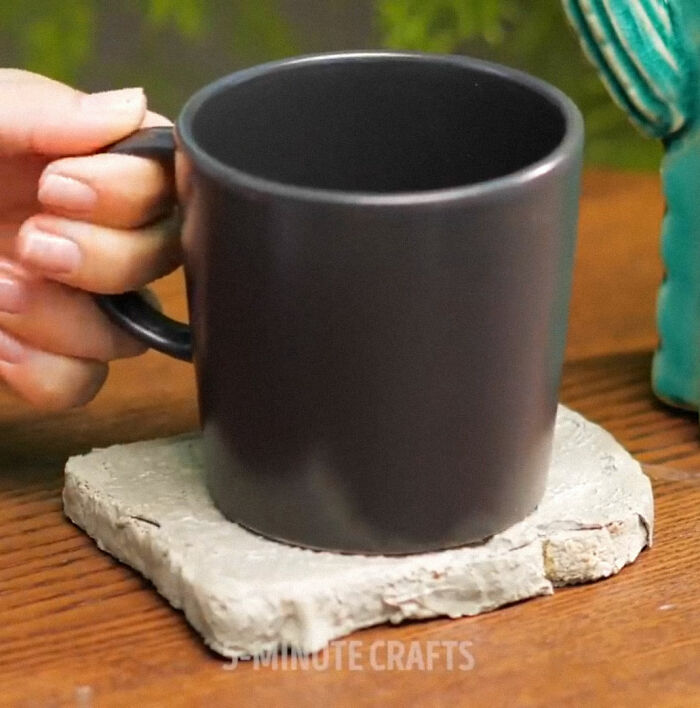 That Is An Actual Piece Of Bread.. Covered In Cement, Being Used As A Table Coaster