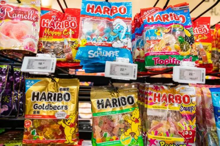 Green Haribo gummy bears are actually strawberry-flavored in the U.S. — and apple-flavored in the UK and Germany.