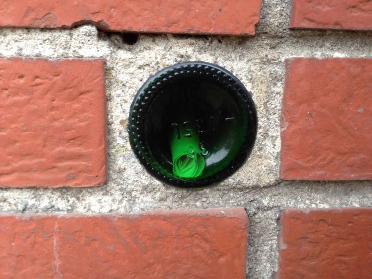 “I found a wall with a bottle build into it which has a small note inside.”