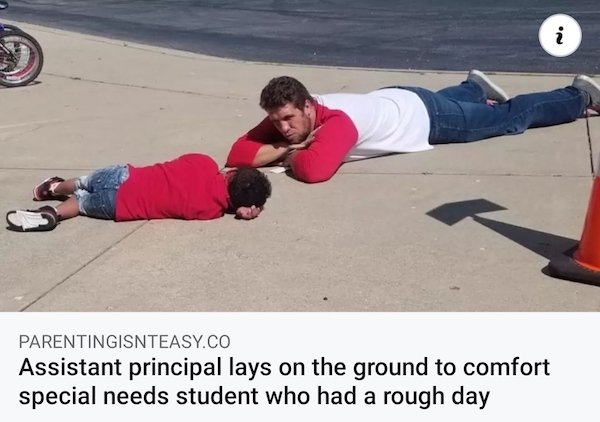 i A Parentingisnteasy.Co Assistant principal lays on the ground to comfort special needs student who had a rough day