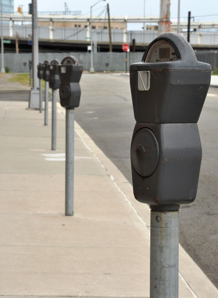 parking meters took credit cards. But they weren't actually connected to a live network at all times. The machine just confirmed the card number was valid and was not expired, then spit out a valid pass. So when my card number got stolen and replaced, I kept my old, cancelled card. Of course when the system tried to run the card later it would be declined. My car and I were long gone by then. Sadly they wised up and now it charges your card before giving you a pass.