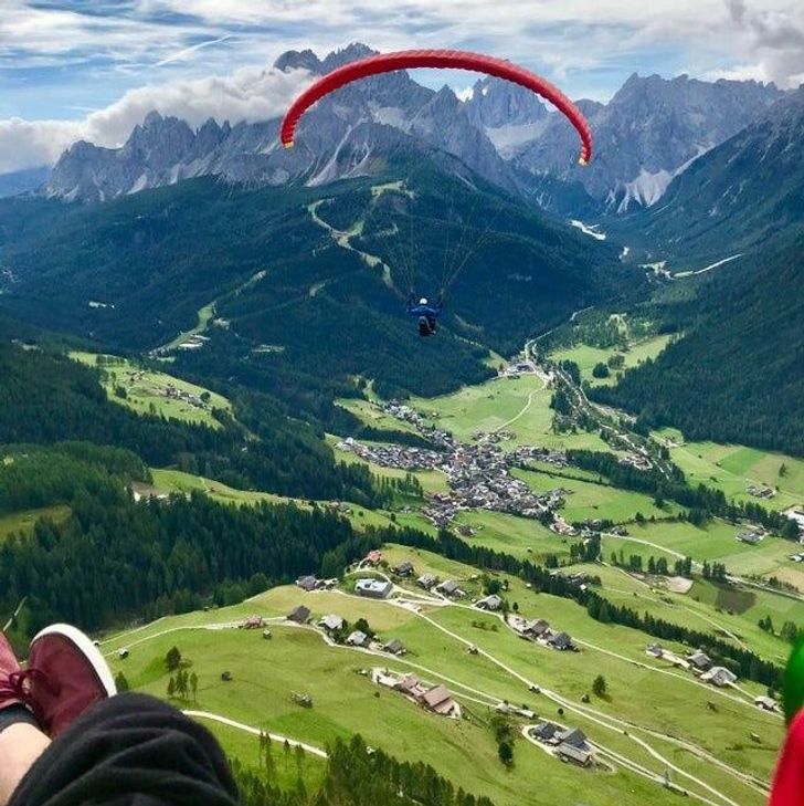 “Me and my brother paragliding in the Italian Alps”