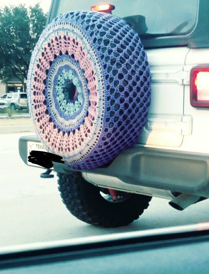 “This crocheted spare tire cover on this Jeep.”