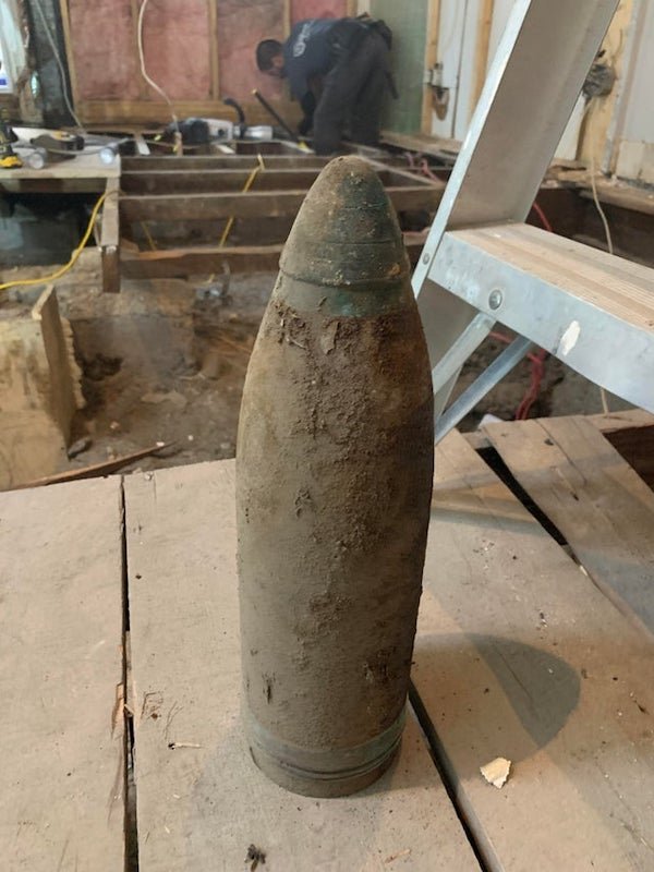 curious objects - old giant artillery round of live ammunition