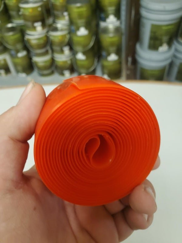 curious objects - orange plastic tape