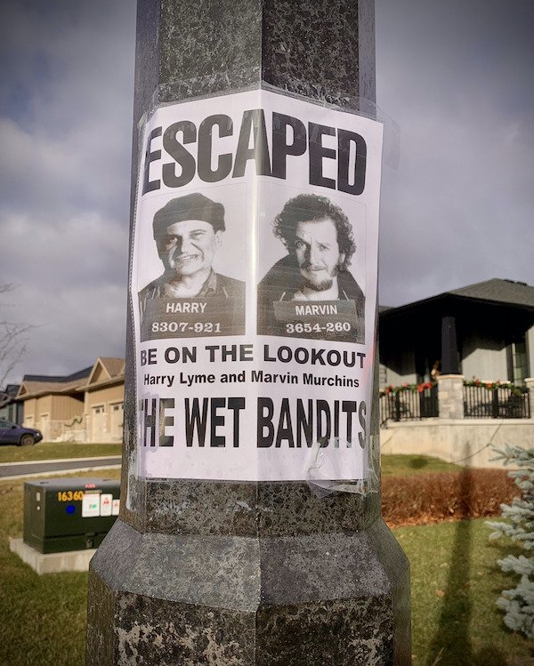 funny memes - escaped wanted poster for the wet bandits from home alone movie