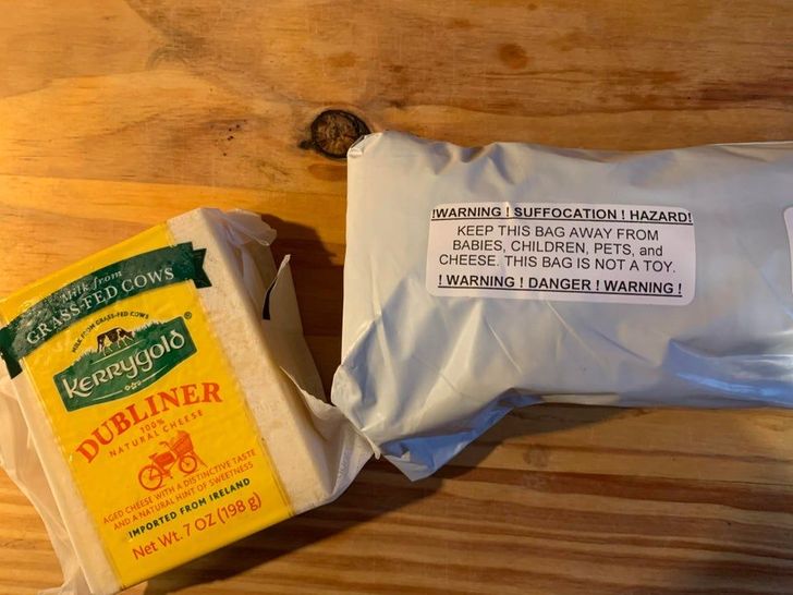 junk food - GrassFed Cows Iwarning I Suffocation ! Hazard! Keep This Bag Away From Babies, Children, Pets, and Cheese. This Bag Is Not A Toy. I Warning I Danger I Warning ! Arik from Cm or Kerrygold 100 Natural Cheese Aged Cheese With A Distinctive Taste 