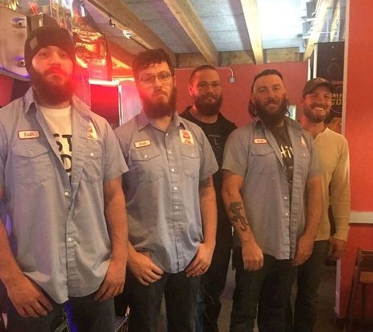 funny photos - brothers wearing dead father's work clothes