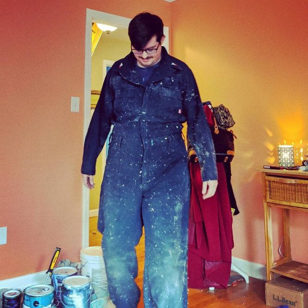 cool pics - man wearing paint covered overalls