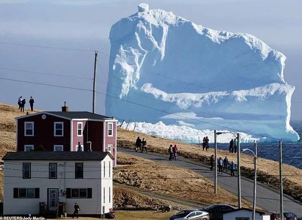 150 foot iceberg passes through iceberg alley near ferryland newfoundland canada - H a Reuters Jody Martin