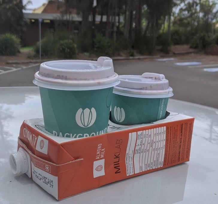 “My local coffee shop recycles milk containers as carry trays.”