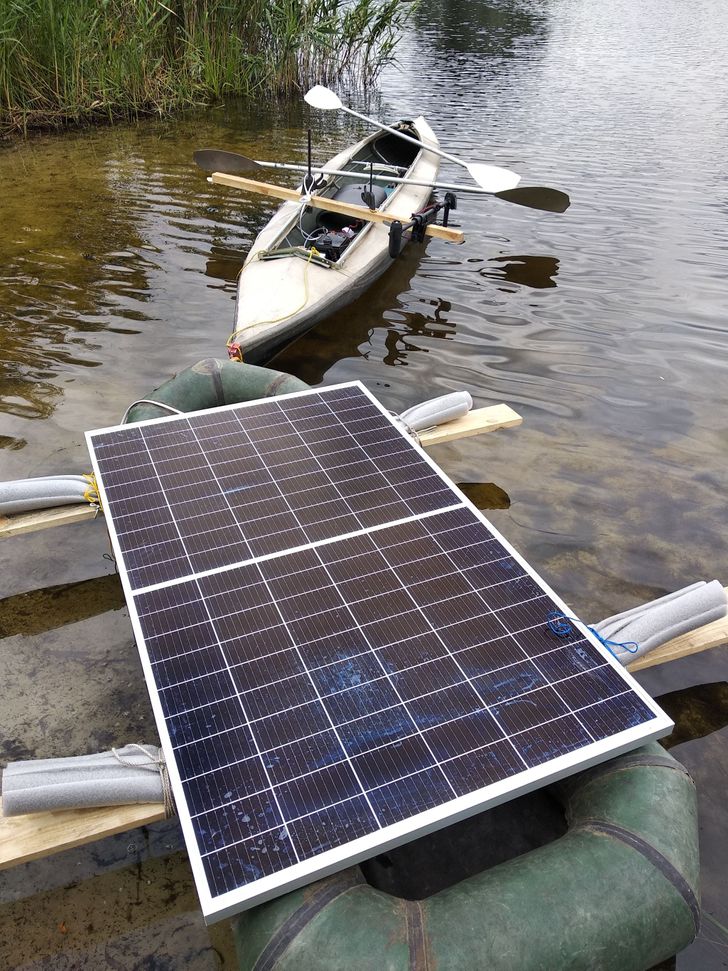 cool pics - guy who used solar panels to power his kayak motor