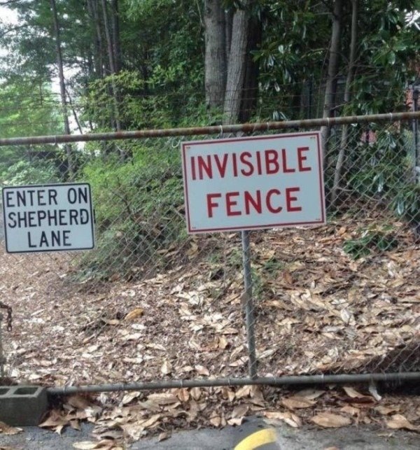 signs that make no sense - Invisible Fence Enter On Shepherd Lane