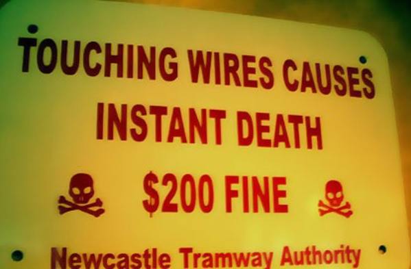sign - Touching Wires Causes Instant Death $200 Fine Newcastle Tramway Authority