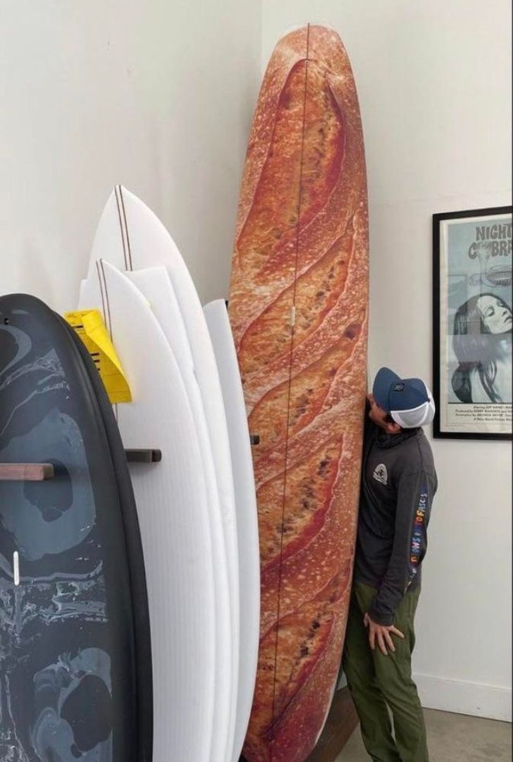 funny food pics -- surfboard painted to look like a baguette loaf of bread