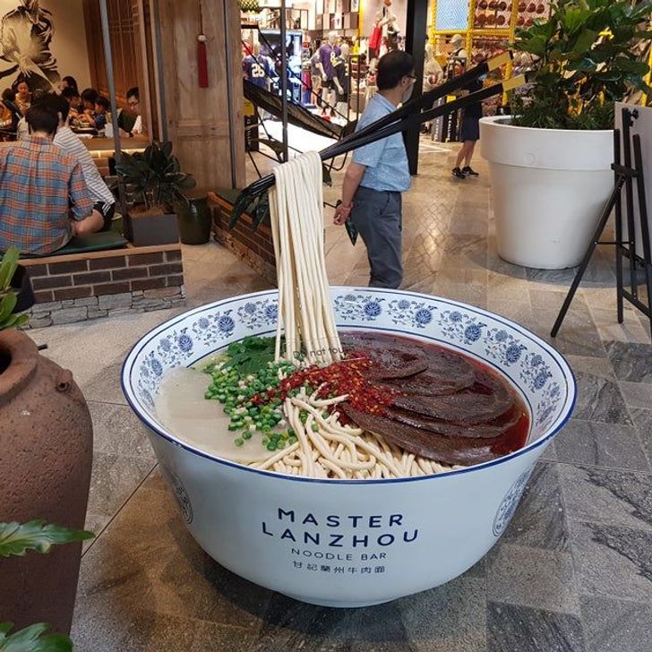funny food pics - Lanzhou Noodle Bar giant bowl of soup sculpture