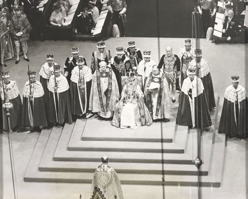 Elizabeth being crowned and enthroned at her coronation, 1953