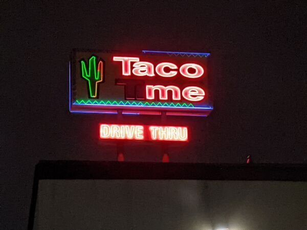 neon sign - you Taco me Drive Thru