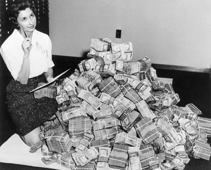 “This is a picture of my grandmother with 1 million dollars. She worked for City Federal Savings Bank. Getty Images now owns the picture.”