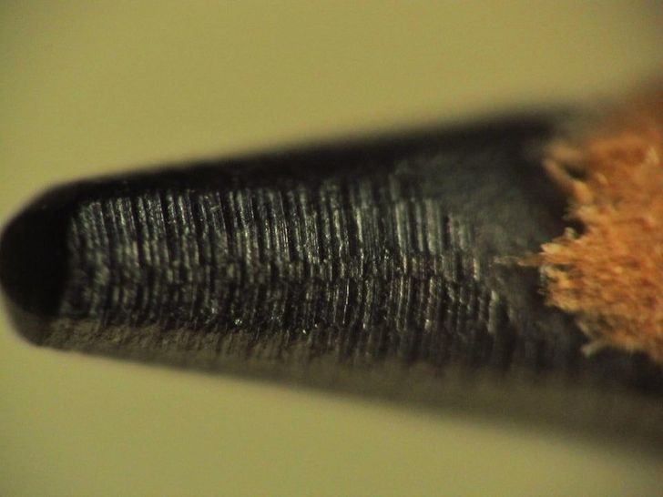 “This is what the tip of a pencil looks like when sharpened by an electric pencil sharpener.”