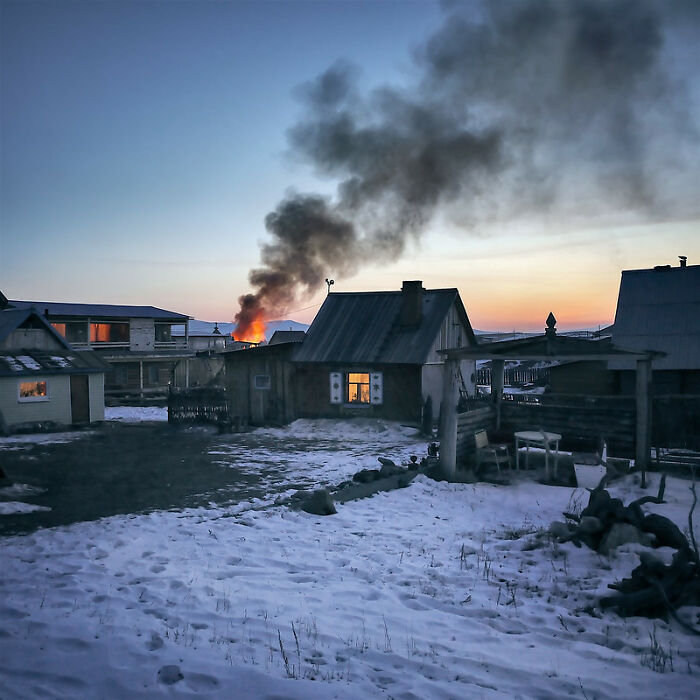 house burning in snow - .