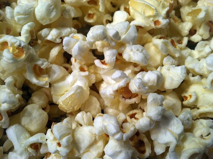 TIL that popcorn, being relatively inexpensive, became popular during the Great Depression. It became a source of income for many struggling farmers, including the Redenbacher family. In fact, when sugar was rationed during WWII, Americans ate three times as much popcorn as they had before.