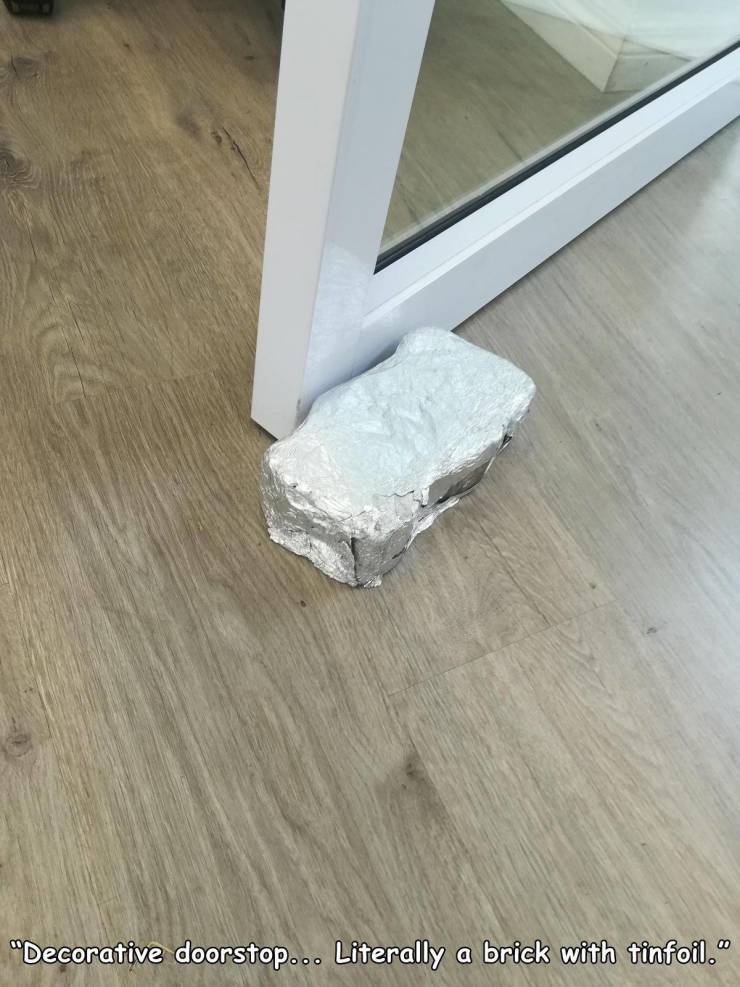 floor - "Decorative doorstop... Literally a brick with tinfoil."